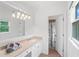Bright bathroom with a large mirror, vanity with sink, and a separate shower area at 2660 Pete Shaw Rd, Marietta, GA 30066