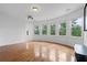 Bright bonus room with hardwood flooring, large windows, and views of the surrounding landscape at 2660 Pete Shaw Rd, Marietta, GA 30066