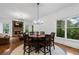 Open dining area with natural lighting, fireplace, and scenic views at 2660 Pete Shaw Rd, Marietta, GA 30066