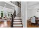 Bright foyer showcasing hardwood floors, staircase, and view into the formal dining and living rooms at 2660 Pete Shaw Rd, Marietta, GA 30066