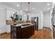 Spacious kitchen boasts a center island, stainless steel appliances, and ample counter space at 2660 Pete Shaw Rd, Marietta, GA 30066