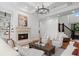 Cozy living room with fireplace, staircase, and natural light at 2660 Pete Shaw Rd, Marietta, GA 30066