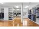 Large walk-in closet with custom shelving for ample storage at 2660 Pete Shaw Rd, Marietta, GA 30066