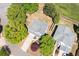 Aerial view of the house surrounded by mature trees at 101 Magnolia Creek Dr, Canton, GA 30115