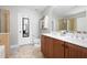Bathroom with a double vanity, neutral walls, tiled floors, with a bathtub and shower combo at 101 Magnolia Creek Dr, Canton, GA 30115