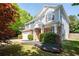Charming two-story home with brick accents and manicured landscaping at 101 Magnolia Creek Dr, Canton, GA 30115