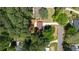 An aerial view of the property showing the house, yard, and surrounding trees at 3456 Thornewood Dr, Atlanta, GA 30340