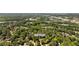 An aerial view of the property with a view of the surrounding neighborhood and trees at 3456 Thornewood Dr, Atlanta, GA 30340