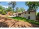 A spacious backyard with a concrete patio and lush green grass at 3456 Thornewood Dr, Atlanta, GA 30340