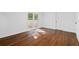 Bright bedroom featuring hard wood floors and direct access to a patio at 3456 Thornewood Dr, Atlanta, GA 30340
