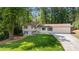 Charming two-story home with a well-manicured lawn and a two-car garage at 3456 Thornewood Dr, Atlanta, GA 30340