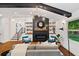 Stylish living room featuring a modern fireplace, sleek shelving, and lots of natural light at 3456 Thornewood Dr, Atlanta, GA 30340