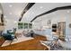 This open-concept home connects the living room, dining area, and kitchen seamlessly at 3456 Thornewood Dr, Atlanta, GA 30340
