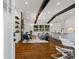 Open-concept living room features hardwood floors, modern lighting, and a sleek design at 3456 Thornewood Dr, Atlanta, GA 30340