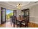 Elegant dining room with chandelier and balcony at 3460 Highgate Hills Ne Dr, Duluth, GA 30097