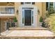 Elegant front entrance with stone steps and stately landscaping at 3460 Highgate Hills Ne Dr, Duluth, GA 30097