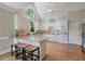 Well-appointed kitchen features granite counters, breakfast bar seating, and modern appliances at 3460 Highgate Hills Ne Dr, Duluth, GA 30097