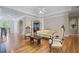 Spacious living room with hardwood floors, elegant furniture, and lots of natural light at 3460 Highgate Hills Ne Dr, Duluth, GA 30097