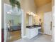 Ensuite bathroom featuring double sinks, granite counters, and tile flooring at 3460 Highgate Hills Ne Dr, Duluth, GA 30097