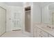 Bright bathroom with tiled floors, walk-in shower, and white cabinets at 4340 Candacraig, Johns Creek, GA 30022