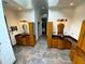 Bathroom featuring double vanities, wood cabinets, designer mirrors and tile flooring at 4340 Candacraig, Johns Creek, GA 30022