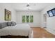 Bright bedroom features a large window and an en suite bathroom at 4340 Candacraig, Johns Creek, GA 30022
