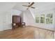 Spacious bedroom with hardwood floors and a large window at 4340 Candacraig, Johns Creek, GA 30022