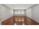 Inviting bedroom features hardwood floors, bright windows, and neutral walls at 4340 Candacraig, Johns Creek, GA 30022
