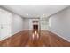 Bonus room with hardwood floors, built in bookshelves, and recessed lighting at 4340 Candacraig, Johns Creek, GA 30022