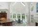Bright breakfast nook with soaring ceilings and an abundance of natural light through beautiful arch windows at 4340 Candacraig, Johns Creek, GA 30022
