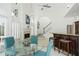 Open breakfast area with a fireplace, and access to stairs at 4340 Candacraig, Johns Creek, GA 30022