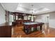 Entertaining game room featuring a bar, pool table, hardwood flooring, and recessed lighting at 4340 Candacraig, Johns Creek, GA 30022