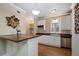 Modern kitchen with stainless steel appliances, wood countertops, and white cabinets at 4340 Candacraig, Johns Creek, GA 30022