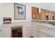 Well-equipped kitchenette features a wine fridge and ample counter space at 4340 Candacraig, Johns Creek, GA 30022