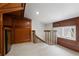 Hallway landing featuring a built-in wet bar and staircase at 4340 Candacraig, Johns Creek, GA 30022