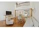 Inviting living room with high ceilings, hardwood floors, and natural light at 4340 Candacraig, Johns Creek, GA 30022