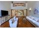 Bright living room with high ceilings, hardwood floors, and natural light at 4340 Candacraig, Johns Creek, GA 30022