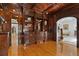 Living room showcasing hardwood floors and custom built-in shelving with decorative molding at 4340 Candacraig, Johns Creek, GA 30022