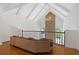 Cozy loft space featuring hardwood floors, beamed ceilings, and lots of light at 4340 Candacraig, Johns Creek, GA 30022