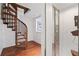 A wooden spiral staircase leads to the upper levels of this unique home at 4340 Candacraig, Johns Creek, GA 30022