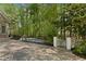 Tennis court on a property in a wooded area at 4340 Candacraig, Johns Creek, GA 30022