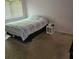 Bedroom showcasing a comfortable bed near a window at 908 Pine Oak Trl, Austell, GA 30168