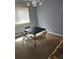 Bright room featuring neutral walls and a table with chairs, perfect for a game or reading at 908 Pine Oak Trl, Austell, GA 30168