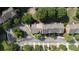 Aerial shot showing a well-maintained neighborhood with mature trees and convenient street access at 2324 Towneheights Se Ter # 11, Atlanta, GA 30339