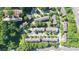 Aerial shot of community showing the well-maintained roofs, landscaping, convenient parking and road access at 2324 Towneheights Se Ter # 11, Atlanta, GA 30339