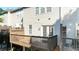 Private wooden deck with railing, offering a relaxing outdoor space at 2324 Towneheights Se Ter # 11, Atlanta, GA 30339