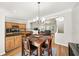 Dining area with table and view of the kitchen featuring stainless steel appliances at 2324 Towneheights Se Ter # 11, Atlanta, GA 30339