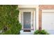 Inviting townhouse front door framed by sidelights and classic brick architecture at 2324 Towneheights Se Ter # 11, Atlanta, GA 30339