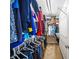 Walk-in closet with clothing racks, storage shelves, and organized hanging space for efficient wardrobe storage at 2324 Towneheights Se Ter # 11, Atlanta, GA 30339