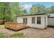 New wooden back deck, is perfect for relaxation in the backyard with a serene outdoor experience at 2450 Elkhorn Dr, Decatur, GA 30034